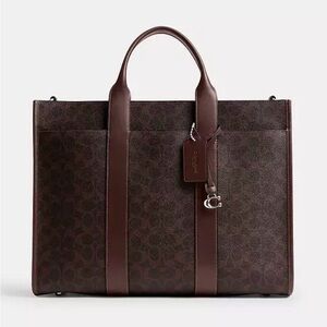 COACH Signature Canvas Wesley Tote Bag
Color:	Maple